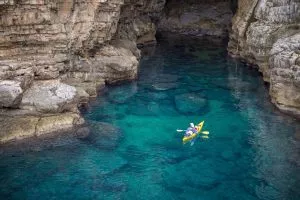 Kayak alongside cliffs, make your journey unique